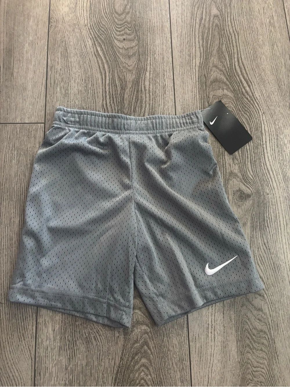 Nike Gray Athletic Mesh Shorts with Swoosh
